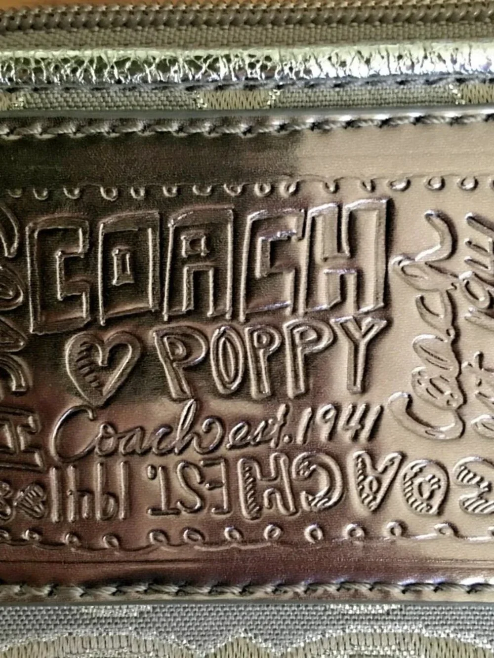 Coach poppy silver
